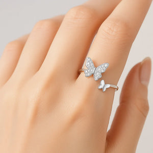 “Aeriella S925 silver double butterfly adjustable ring with 3D motifs and high-polish finish.”
