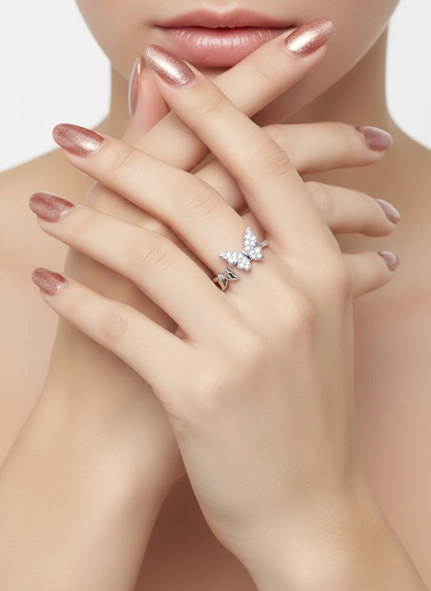 “Aeriella S925 silver double butterfly adjustable ring with 3D motifs and high-polish finish.”
