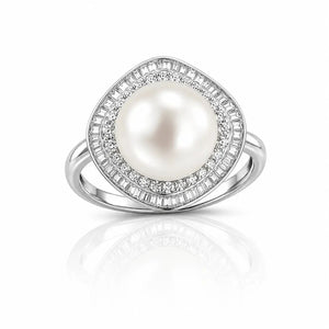 A silver-toned ring featuring a large oval white pearl surrounded by a double halo of small clear stones, set against a clean white background with a soft reflection below.