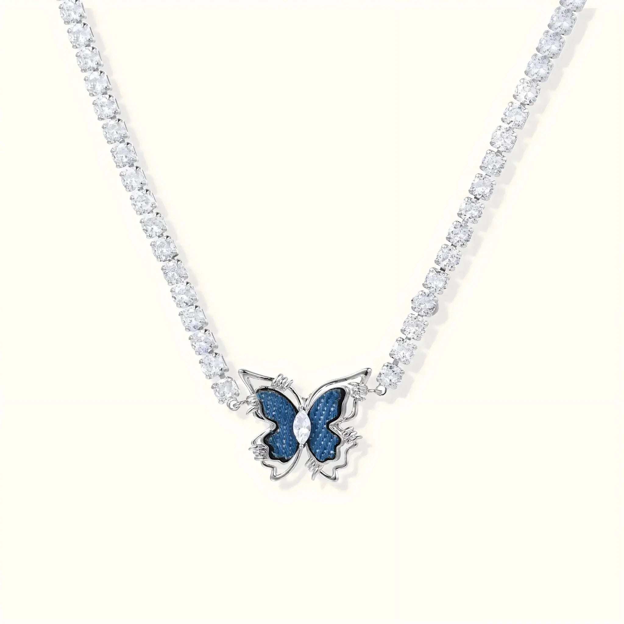 Necklace with a blue butterfly pendant on a white background