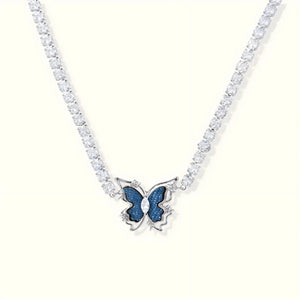 Necklace with a blue butterfly pendant on a white background