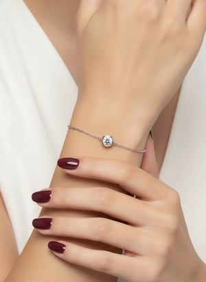 Aurelia S925 sterling silver moissanite tennis bracelet in Silver/Rose Gold with adjustable fit and lobster clasp.