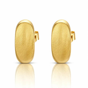 A pair of gold oval hoop earrings with a textured matte finish, displayed on a clean white background with a soft reflection below.