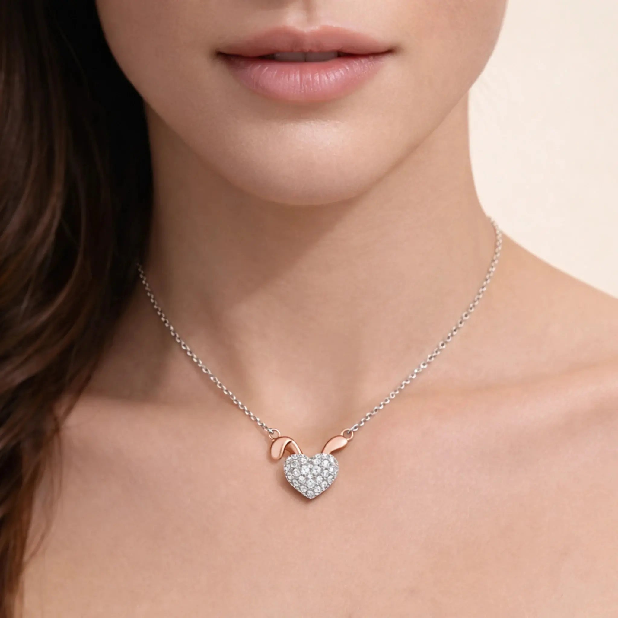 925 silver bunny heart pendant necklace with crystal accents on woman's neck