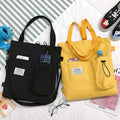 Canvas tote bag with front pocket, top handle, and adjustable crossbody strap – Canvas Pocket Tote by Jewellar
