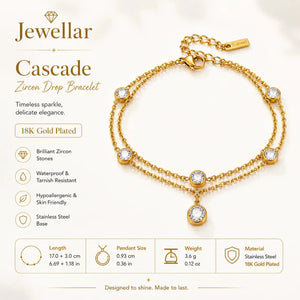 A gold double-strand chain bracelet with five bezel-set clear round stones and a dangling round stone charm, shown on a clean white background.