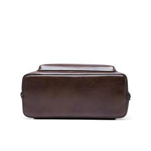 Casual Travel Leather Backpack in PU leather with zipper closure, available in Black and Brown, lightweight and spacious for daily essentials.