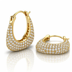 Gold hoop earrings with diamond accents on a white background