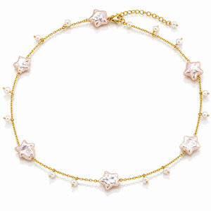 A delicate gold chain necklace featuring five rose gold star-shaped settings with clear rhinestones, accented by small white faux pearls spaced along the chain, shown on a white background.