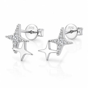 A pair of sterling silver star stud earrings with clear pavé-set stones on one star and a polished silver star on the other, shown on a reflective white background.