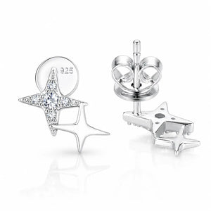 Sterling silver star stud earrings with clear cubic zirconia accents, shown from multiple angles on a reflective white background. One earring is shown from the front with the '925' sterling silver hallmark visible on the post, and another shows the butterfly back.