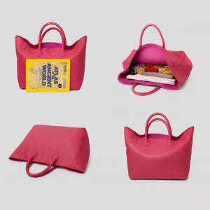 Black genuine leather super tote bag with large capacity, dual handles, and structured square shape – Chic Leather Super Tote.