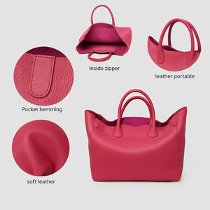 Black genuine leather super tote bag with large capacity, dual handles, and structured square shape – Chic Leather Super Tote.