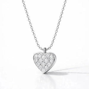 Heart-shaped diamond pendant necklace on a white background