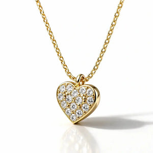 Gold heart-shaped necklace with diamond accents on a white background
