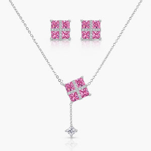 Jewelry set with pink gemstone necklace and earrings on a white background
