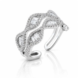 A silver-toned open cuff ring adorned with baguette and round-cut clear stones, shown on a clean white background with a soft reflection below.