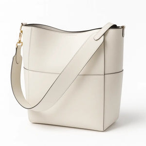 Elara womens genuine leather bucket tote in Black, Earth Yellow, Olive Green, and White with magnetic buckle and inner pocket (330×330×120 mm).