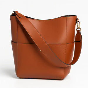 Elara womens genuine leather bucket tote in Black, Earth Yellow, Olive Green, and White with magnetic buckle and inner pocket (330×330×120 mm).