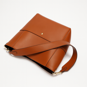 Elara womens genuine leather bucket tote in Black, Earth Yellow, Olive Green, and White with magnetic buckle and inner pocket (330×330×120 mm).