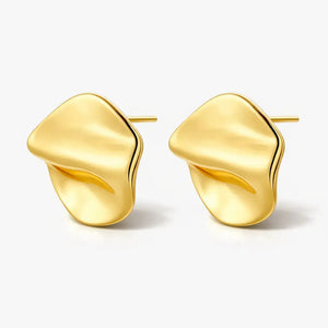 Abstract gold-plated sterling silver flow stud earrings on a white background