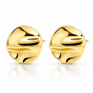 A pair of gold abstract stud earrings with a smooth, organic wavy design, displayed on a clean white background with a soft reflection below.