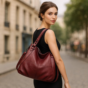 Elegant genuine leather large capacity shoulder bag in classic design with versatile carrying options – by Jewellar