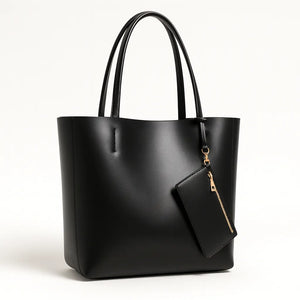 Elegant large-capacity tote bag made from genuine cowhide leather, bucket-style design with soft polyester-cotton lining, available in black, gold, and silver.