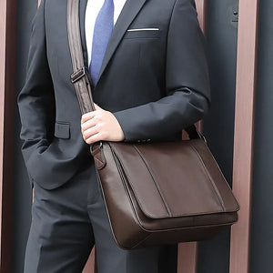 Hawthorne men’s brown genuine oil-wax leather messenger shoulder bag, 34.5×11×26.5 cm, 1.15 kg, adjustable strap.