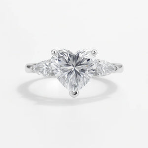 S925 sterling silver heart halo ring with 8×8 mm heart-cut high-carbon center and micro-pavé accents (HeartLuxe).