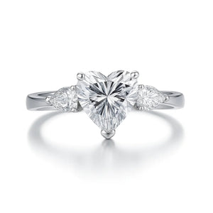 S925 sterling silver heart halo ring with 8×8 mm heart-cut high-carbon center and micro-pavé accents (HeartLuxe).