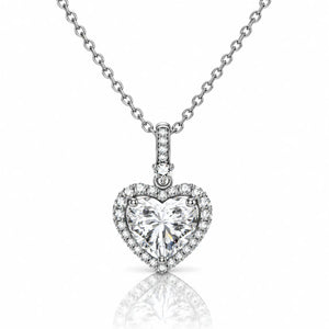 A heart-shaped diamond pendant necklace on a silver chain, set against a clean white background with a soft reflection below.