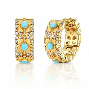 Gold hoop earrings with turquoise stones on a white background