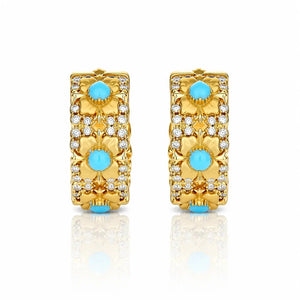 Gold hoop earrings with turquoise stones on a white background