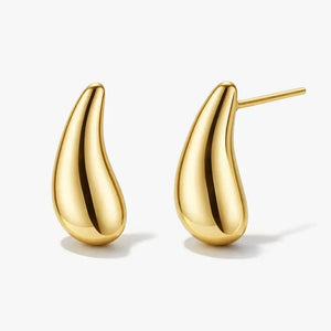 gold teardrop stud earrings with smooth polished finish on a plain white background