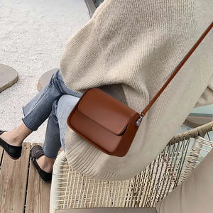 Liora niche design genuine leather crossbody bag in black and brown with multiple carrying options – by Jewellar