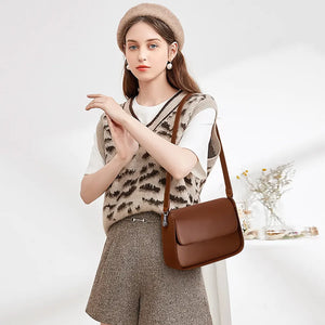 Liora niche design genuine leather crossbody bag in black and brown with multiple carrying options – by Jewellar