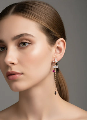 LuckyBloom S925 rose-gold asymmetrical four-leaf clover earrings with zirconia, 40 mm drop, push-back closures.