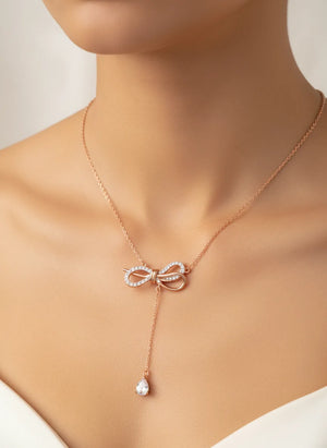 Lumine S925 sterling silver bow necklace with CZ accents, adjustable 39 cm + 4 cm extender in Silver or Rose Gold.
