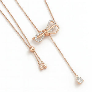Lumine S925 sterling silver bow necklace with CZ accents, adjustable 39 cm + 4 cm extender in Silver or Rose Gold.