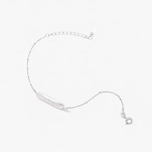 Baroque pearl 925 silver bracelet with delicate adjustable chain on white background