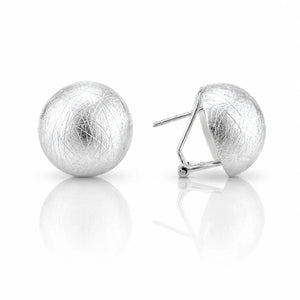 A pair of textured silver ball stud earrings, one shown from the front and the other from the side displaying the post and butterfly back, on a reflective white surface.