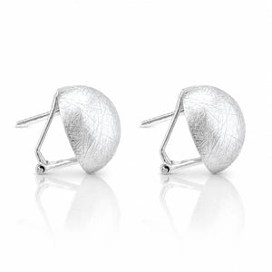 A pair of silver stud earrings with a textured, leaf-like dome design and a geometric wireframe back, shown on a reflective white surface.