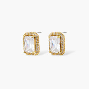 Gold halo stud earrings with rectangular clear gemstones and pavé detailing on white background