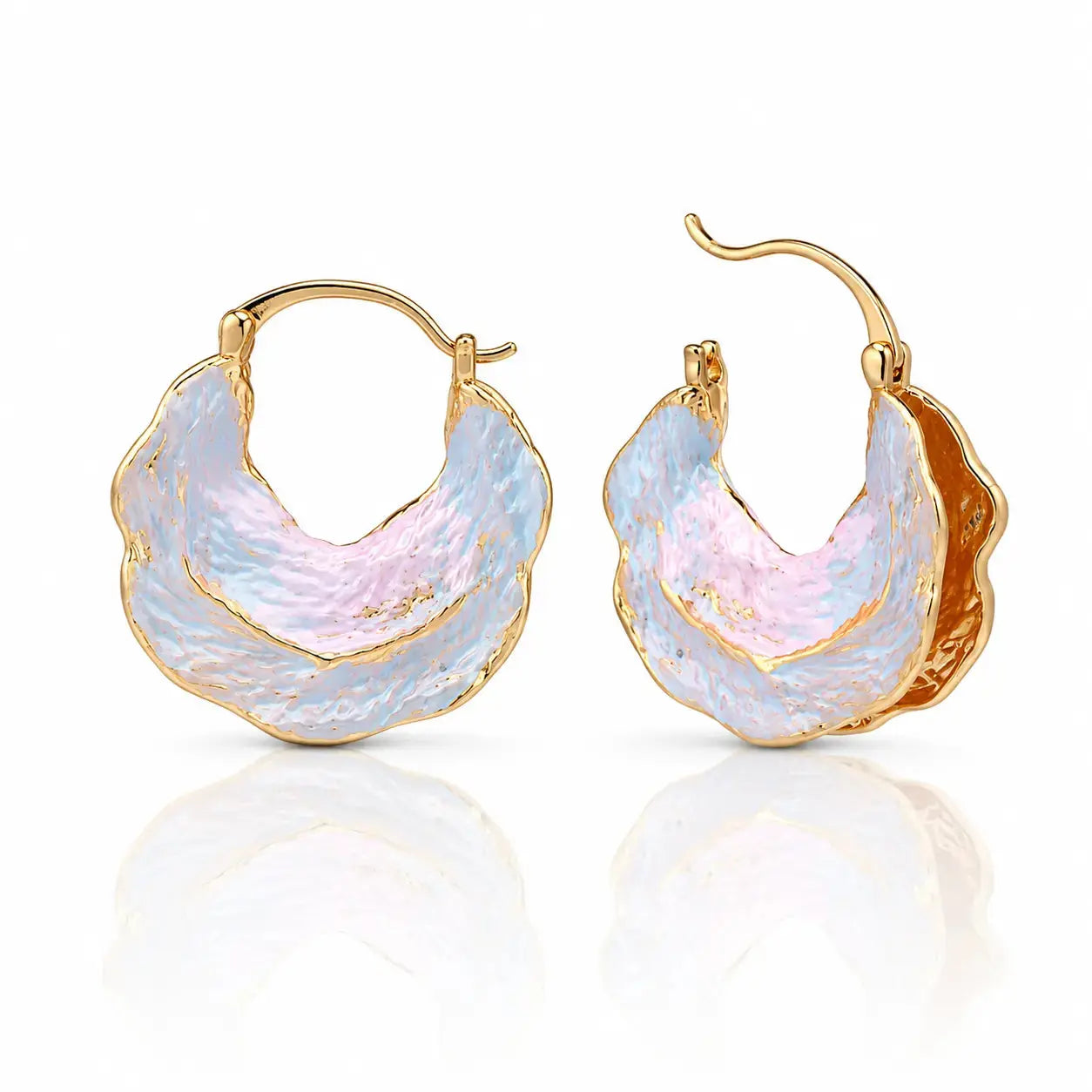 Gold hoop earrings with a textured, multicolored design on a white background