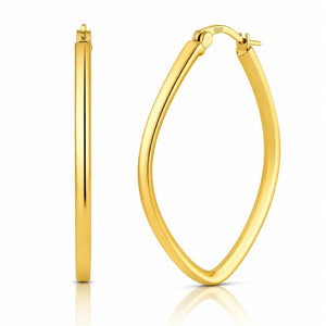 Gold hoop earrings on a white background