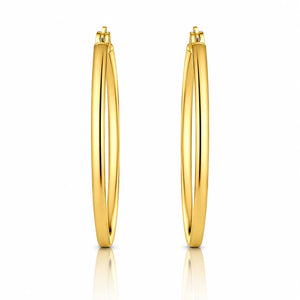 Gold hoop earrings on a white background