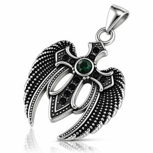 A silver-toned angel wing pendant featuring a central green gemstone surrounded by small black stones, set against a clean white background with a subtle reflection.