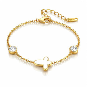 A gold chain bracelet with a central four-leaf clover charm, two bezel-set clear rhinestones, and an adjustable clasp with an extender chain. The brand name '18KGP' is engraved on the small tag near the clasp.