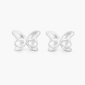 Butterfly-shaped earrings on a white background